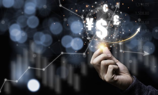 Hand holding virtual world with dollar yuan yen euro and pound s