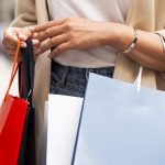 woman-out-shopping-spree-while-holding-many-shopping-bags-150x150.jpg